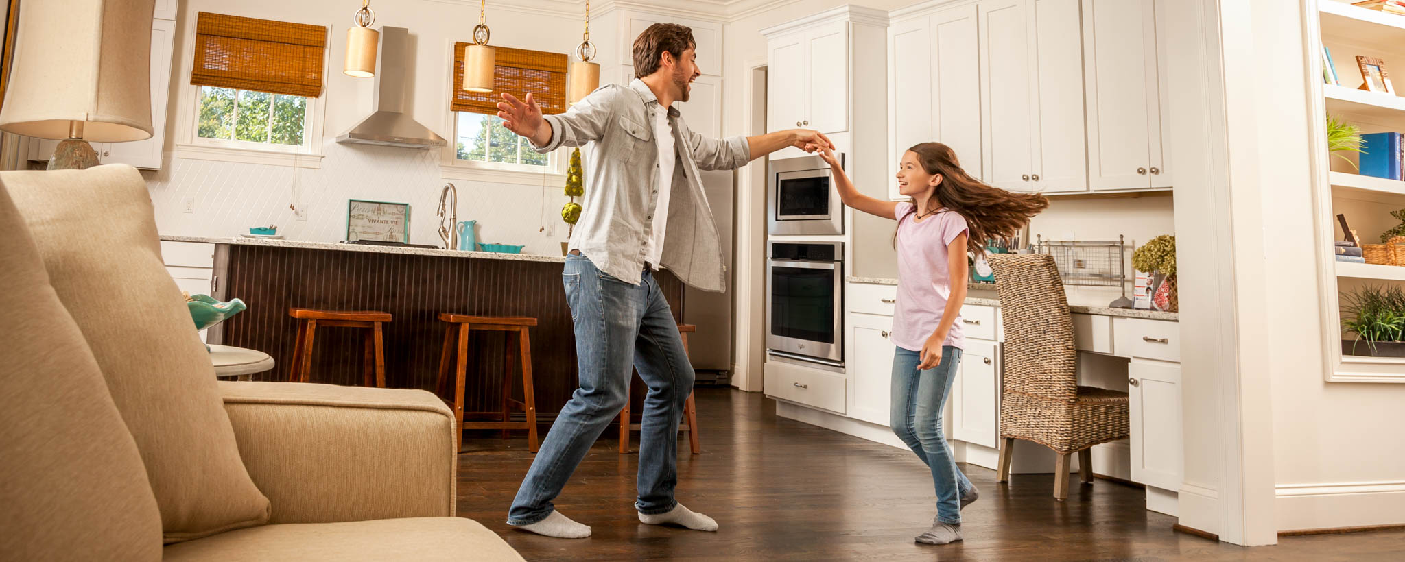 Dad dancing with his daughter