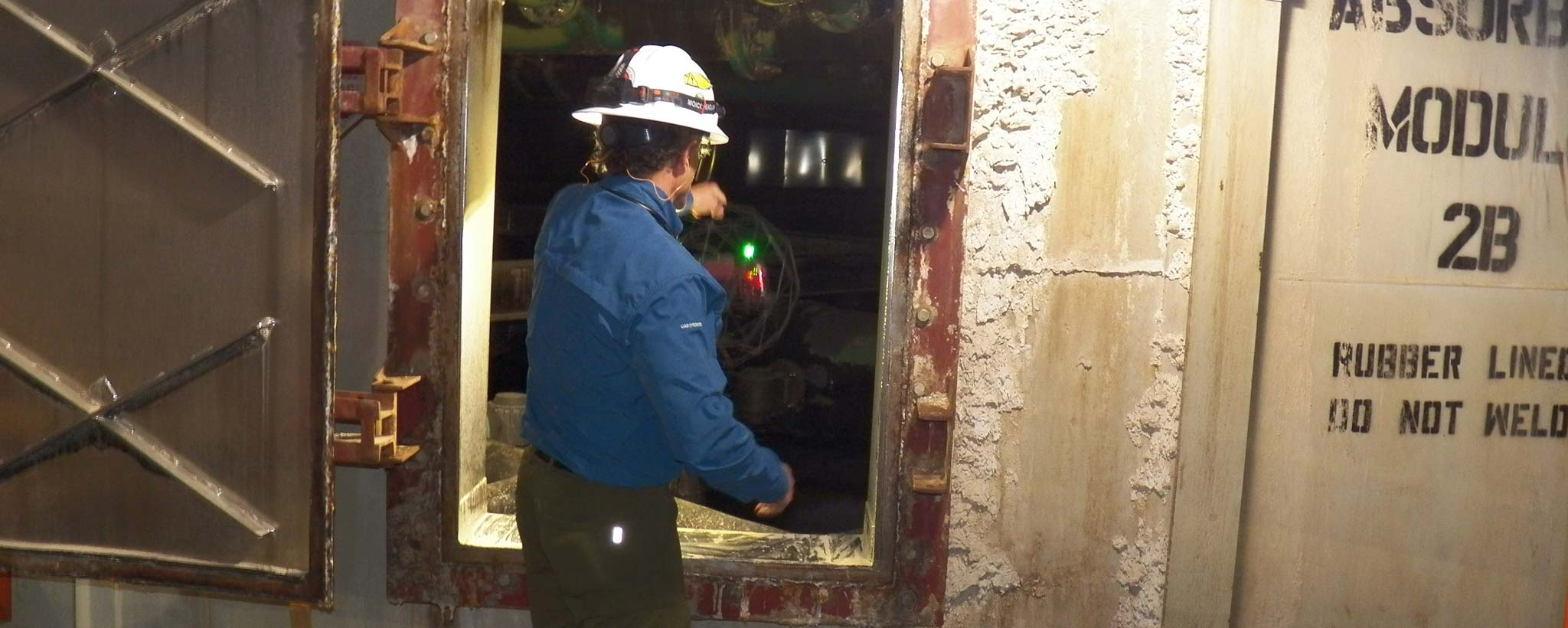Worker inspecting the scrubber