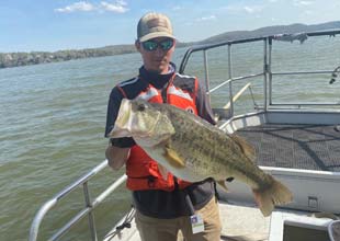TVA biologist holding a fish