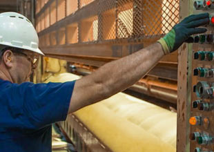 Employee working in the steel mill