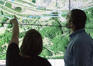 Man and woman looking at CCR map