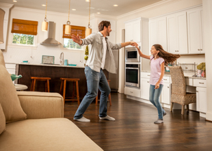 Dad dancing with his daughter