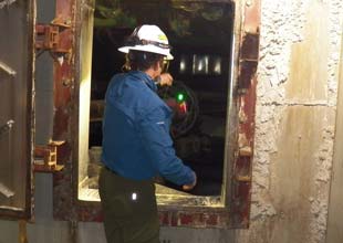 Worker inspecting the scrubber