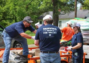 Employees helping community