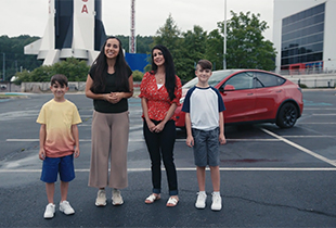 family with tesla and rocket