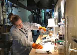 Scientist making hand sanitizer