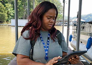 Jori Chatman using digital tablet