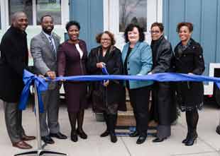 Representatives cutting the ribbon