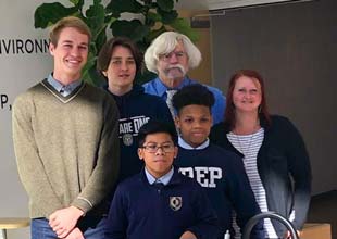Students with delivered car parts