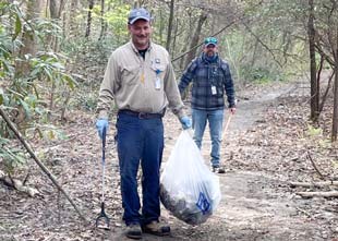 Volunteers picking up trash