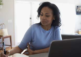 Woman working on savings