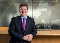 CEO Jeff Lyash in front of TVA map