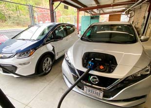 An electric vehicle at a charging station