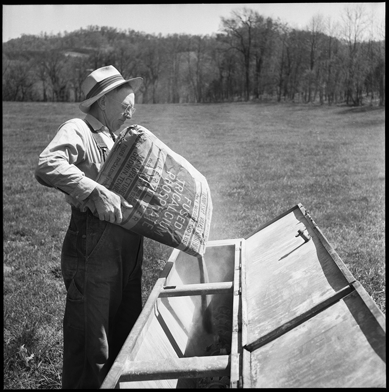 Farmer mixing fertilizer