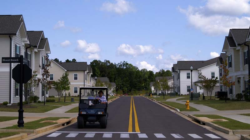 Oxford, Mississippi Resident driving a golf cart