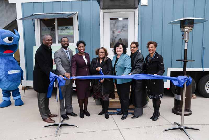 Representatives cutting the ribbon