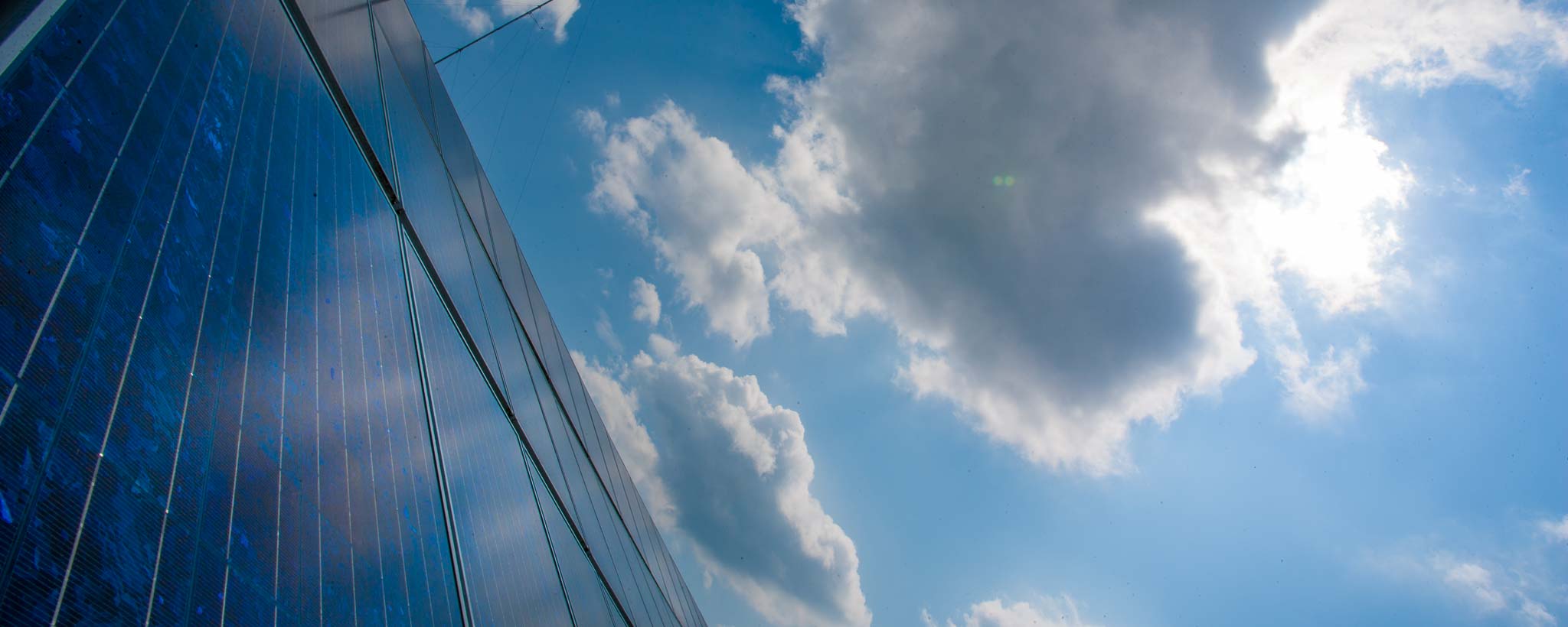 Solar Panels with blue sky and clouds