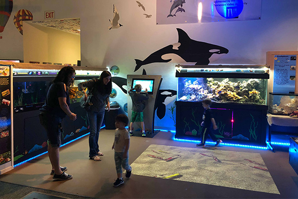 A little kid on the Hands-on Science Center
