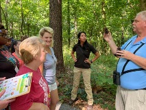 Damien Simbeck discussing pinecone with Birdability participants